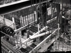 Dagenham Sewage Works Reconstruction IV, looking down into dam, and showing workmen,1965