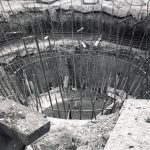Dagenham Sewage Works Reconstruction IV, looking down into dam, showing complete circle of steel rods for hopper,1965