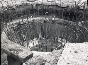 Dagenham Sewage Works Reconstruction IV, looking down into dam, showing complete circle of steel rods for hopper,1965