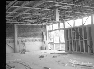 Barking Central Library reconstruction, showing construction of ceiling and walls in new section, 1965