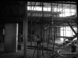Barking Central Library reconstruction, showing steel skeleton of interior of new section,1965