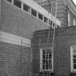 Barking Central Library reconstruction, showing exterior view of junction of old Children’s Library and new building, 1965