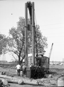 Riverside Sewage Works Reconstruction V, showing pile driver, 1965
