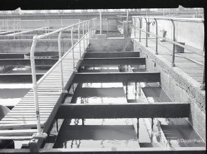 Riverside Sewage Works Reconstruction V, showing view above sludge mixer tanks and footbridge, 1965