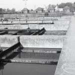 Riverside Sewage Works Reconstruction V, showing view of stone edging of sludge tanks, 1965