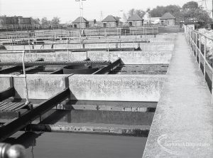 Riverside Sewage Works Reconstruction V, showing view of stone edging of sludge tanks, 1965