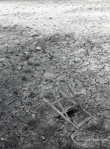 Riverside Sewage Works Reconstruction V, showing chair abandoned on mud, 1965