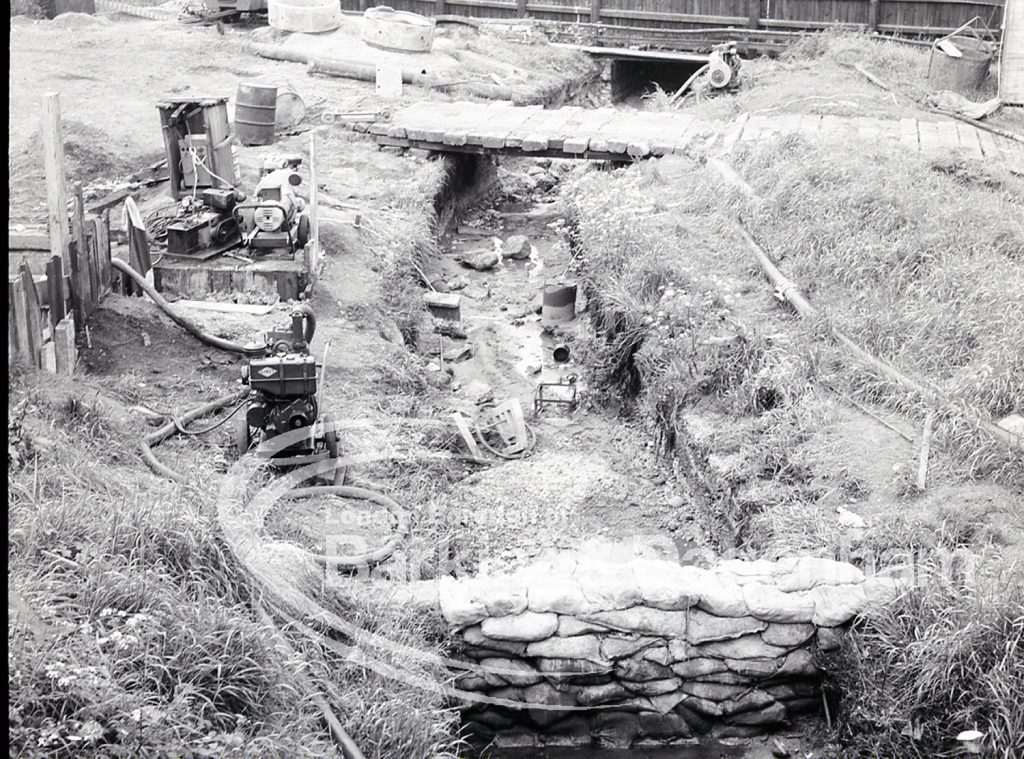 Lower Wantz Sewer Environment scheme II, showing the formation before piping installed, looking south, 1965