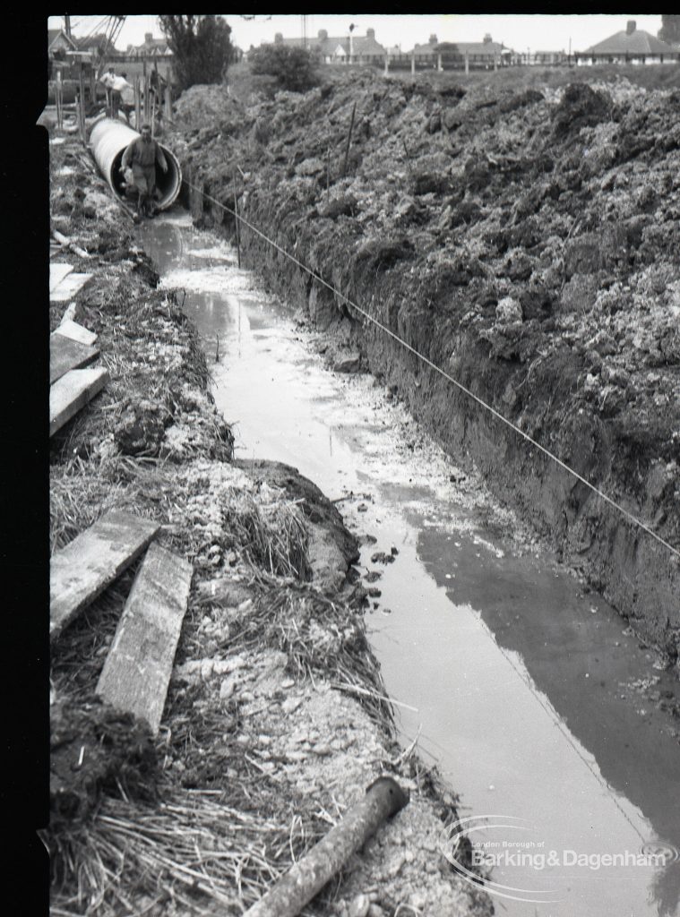 Lower Wantz Sewer Environment scheme II, showing reinforced concrete flow of trench, with pipe at top, looking north, 1965