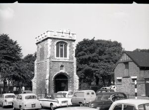 Old Barking, taken for ‘Barking Record’, showing oblique view of Curfew Tower, and with cars, 1965