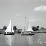 Boating at Mayesbrook Park, Dagenham, showing two sailing yachts, 1965