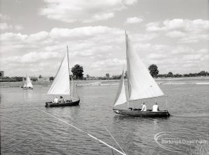 Boating at Mayesbrook Park, Dagenham, showing two sailing yachts approaching each other, 1965
