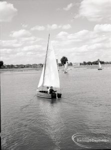 Boating at Mayesbrook Park, Dagenham, showing yacht sailing, 1965