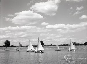 Boating at Mayesbrook Park, Dagenham, showing yachts sailing and heavy cloud in sky, 1965