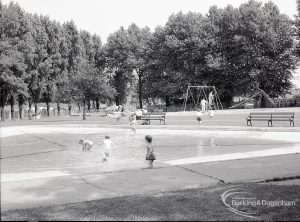 Pondfield Park, Reede Road, Dagenham, showing children in the paddling pool and trees, 1965