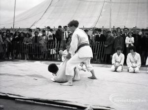 Dagenham Town Show 1965, showing judo demonstration fall with arm grip, and two people kneeling, 1965