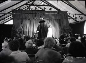 Dagenham Town Show 1965, showing fashion display and audience, with front view of model, 1965