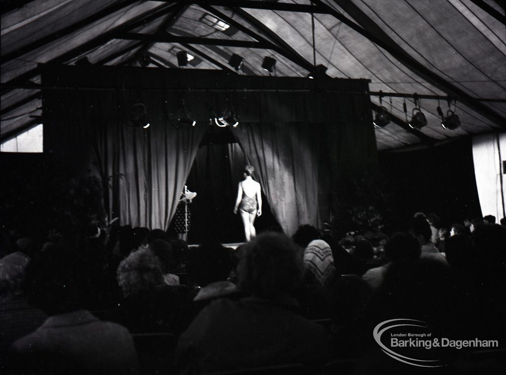 Dagenham Town Show 1965, showing fashion display and audience, with rear view of model, 1965