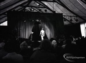 Dagenham Town Show 1965, showing fashion display and audience, with rear view of model, 1965