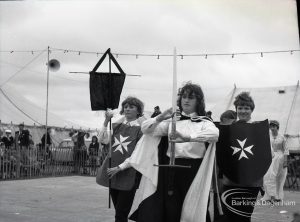 Dagenham Town Show 1965, showing open air religious play, with three people, two with Maltese crosses, 1965