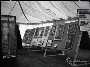 Dagenham Town Show 1965, showing pictures in art exhibition and two visitors, 1965