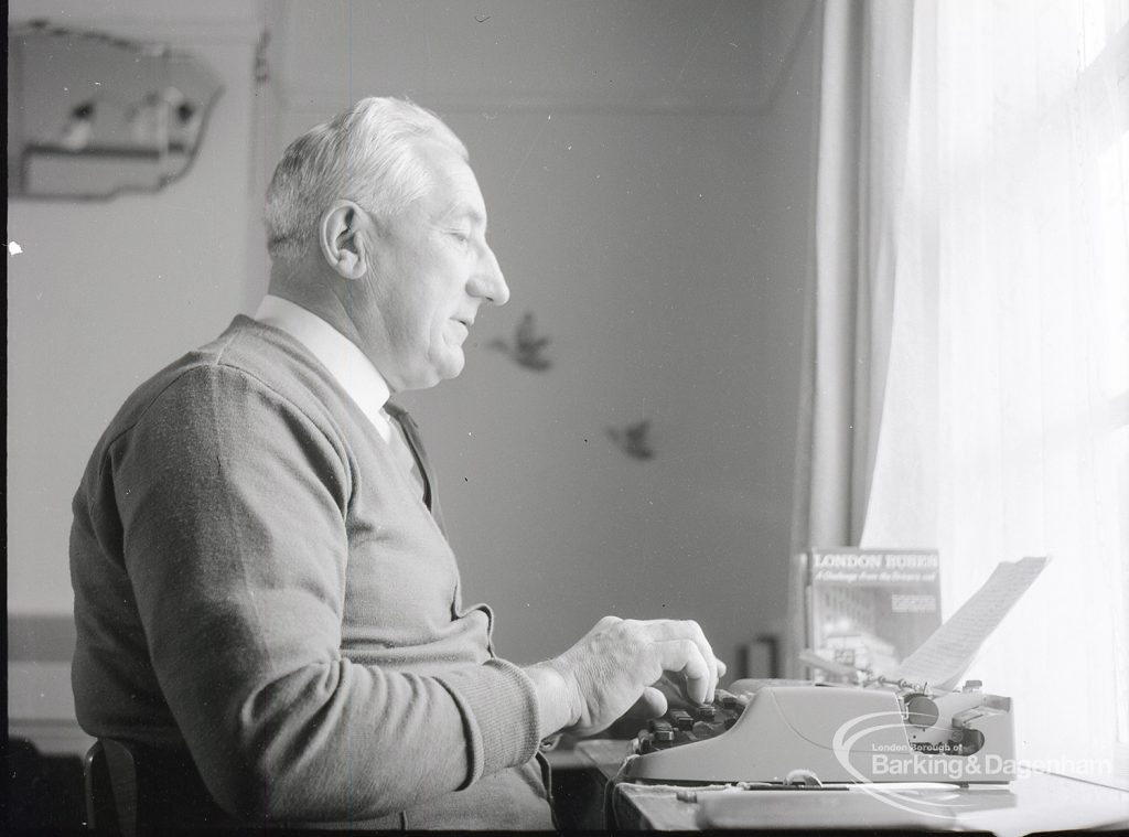 Mr Ted Murphy, 3 Raydons Road, Dagenham, looking right and down, author of ?The Big Load? and ?London Buses?, photographed for ?Barking Record?, 1965