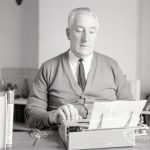Mr Ted Murphy, 3 Raydons Road, Dagenham, full face photograph and typing, and with books standing to left, author of ?The Big Load? and ?London Buses?, photographed for ?Barking Record?, 1965