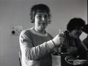 Adult Training College at Osborne Square showing a girl opertating a drill, 1965
