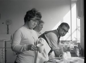 Adult Training College at Osborne Square showing a girl washing up, 1965