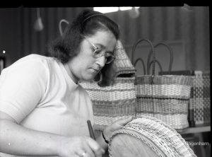 Adult Training College at Osborne Square showing a girl finishing a circular basket, 1965