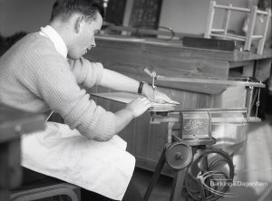 Adult Training College at Osborne Square showing a boy cutting with a treadle saw 1965
