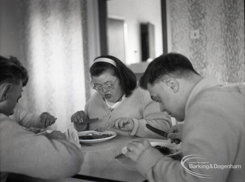 Adult Training College at Osborne Square showing three students at a table including a girl at lunch time, 1965