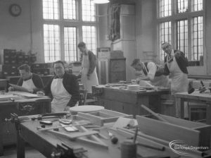 The Welfare Department Training Centre at Eastbury House showing men in a woodwork workshop, 1965