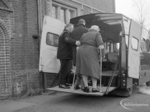 The Welfare Department Training Centre at Eastbury House showing elderly passengers being assisted onto the vehicles via a ramp, 1965