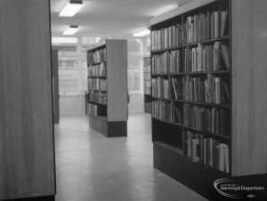 The Barking Library’s New Lending Deparment showing the views of the cases from the wall facing stacks, 1965