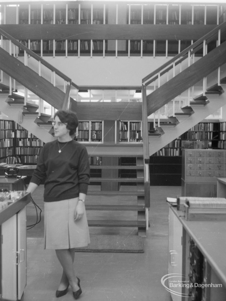 The Barking Library’s New Lending Deparment showing a number of wall stacks behind the staircase, 1965