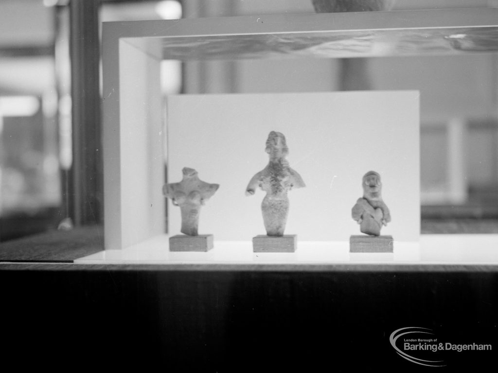 Sumerian exhibition at Fanshawe Library, Dagenham, showing three small figures, 1966