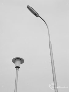 Lighting with specially erected sample lamp-posts at Barking, showing all round columns with standard and curved lights, 1966