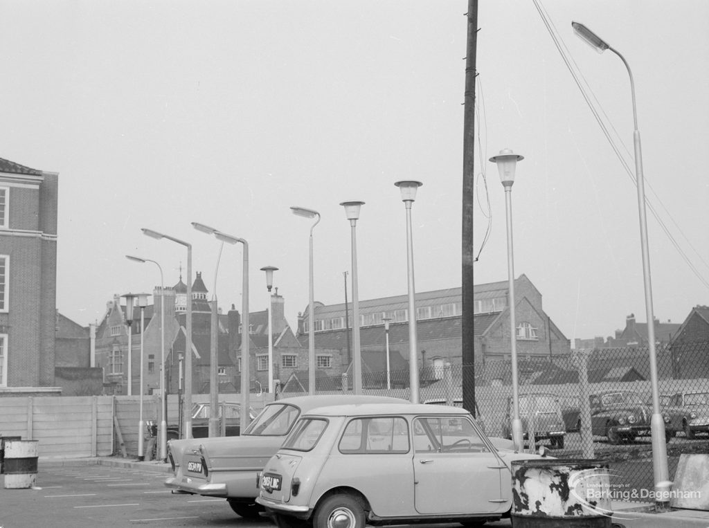 Lighting with specially erected sample lamp-posts at Barking, showing the whole of the sample lamp-posts behind Barking Town Hall, 1966