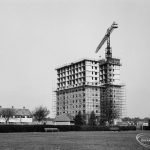 Church Elm Lane, Dagenham Housing Development II, showing the tower block and crane from the south-east of the arena, 1966