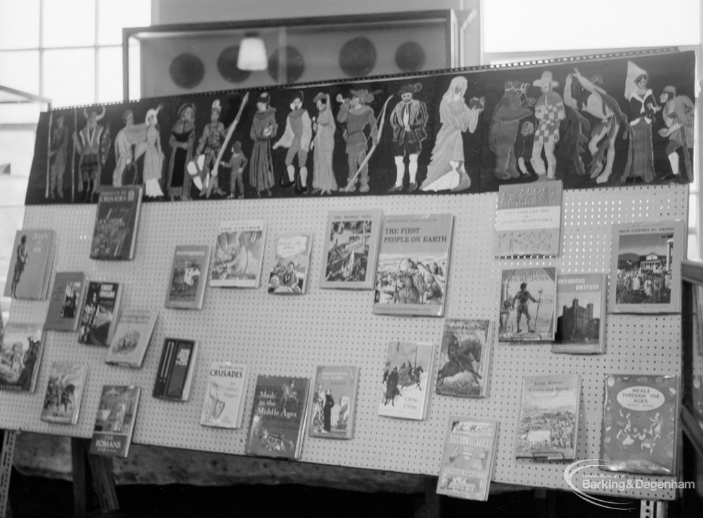 Barking Libraries exhibition at Valence House, Dagenham for National Book Week, showing display of books on bookstand, 1966