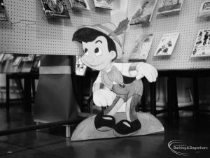 Barking Libraries exhibition at Valence House, Dagenham for National Book Week, showing close-up of the Pinocchio cardboard cut out, 1966
