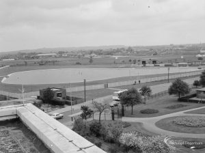 Becontree Heath showing the view from the south-west of the Civic Centre, Dagenham of the balancing and boating lake, 1966