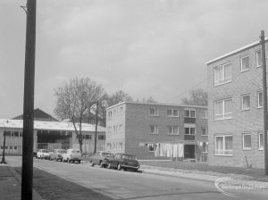 Housing in John Burns Drive, off Ripple Road, Barking, showing detached three-storey square block of flats and neighbouring block [possibly in Lancaster Road], 1966