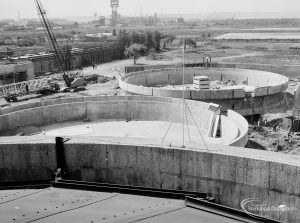 Riverside Sewage Works Reconstruction XI, showing view of digestion tanks from top of gasholder, 1966