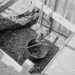 Riverside Sewage Works Reconstruction XI, showing bucket in cavity below girder, 1966