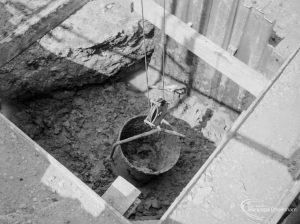Riverside Sewage Works Reconstruction XI, showing bucket in cavity below girder, 1966
