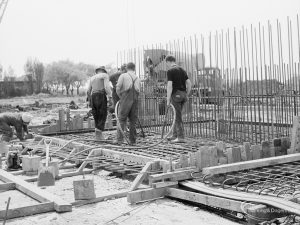 Riverside Sewage Works Reconstruction XI, showing men working on construction of floor, 1966