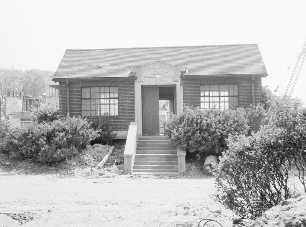 Riverside Sewage Works Reconstruction XI, showing former small, raised symmetrical building, dated 1934 and near main old buildings, 1966