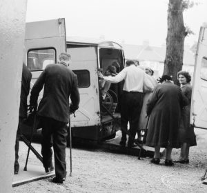 Training Centre at Eastbury House, Barking, showing disabled people approaching tail-lift ambulance, 1966